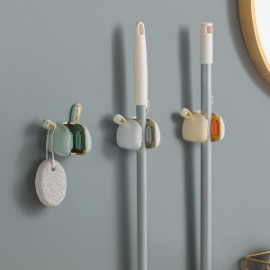 a cute and fun wall mounted rabbit ear mop hook without drilling holes