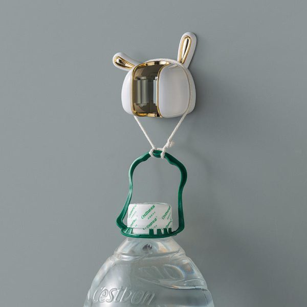 a cute and fun wall mounted rabbit ear mop hook without drilling holes